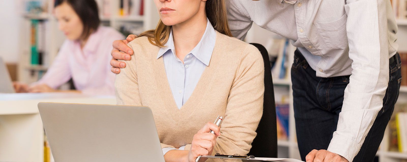 Employee in California consulting with an attorney after workplace harassment